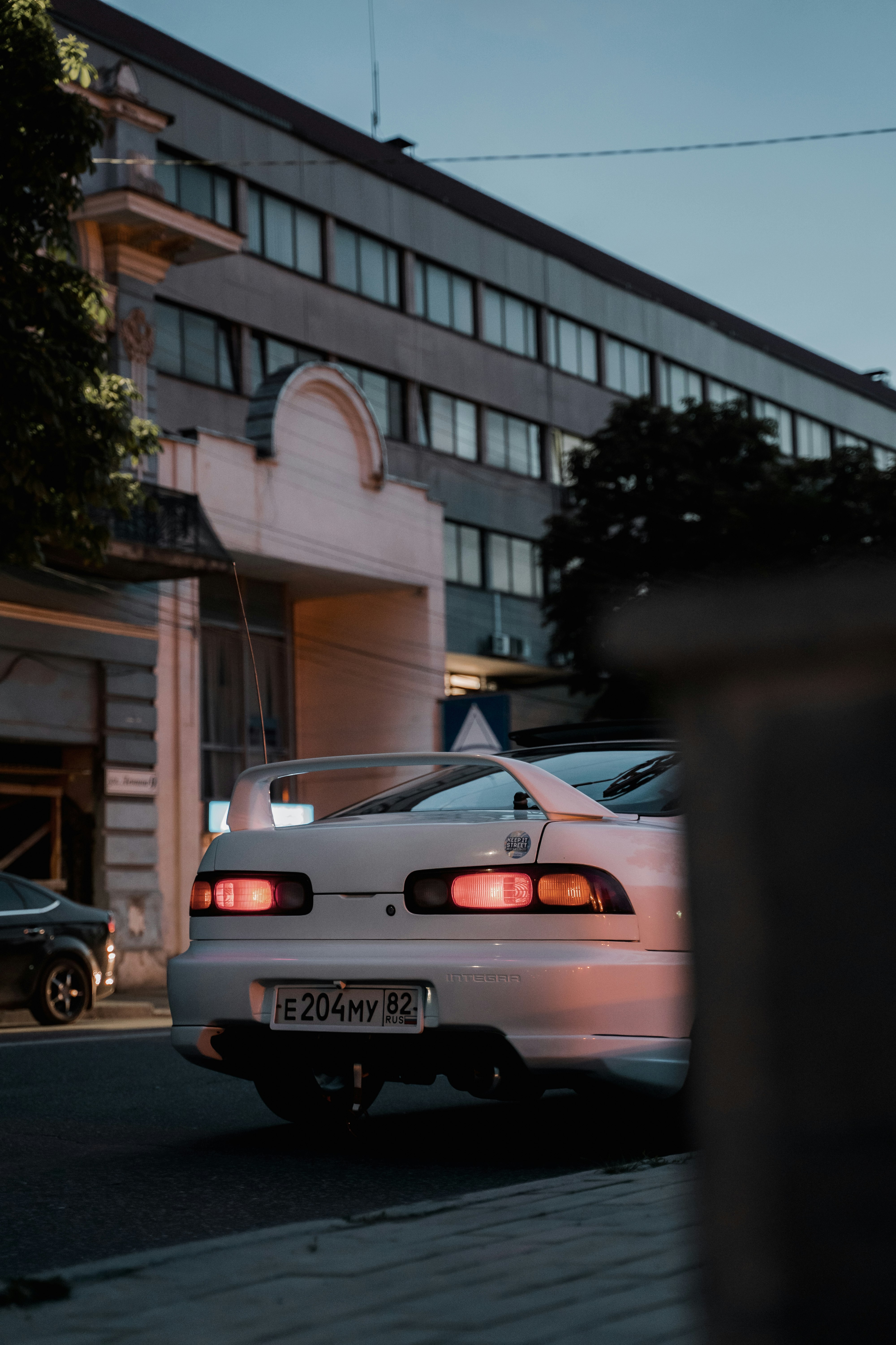 white bmw m 3 parked on street